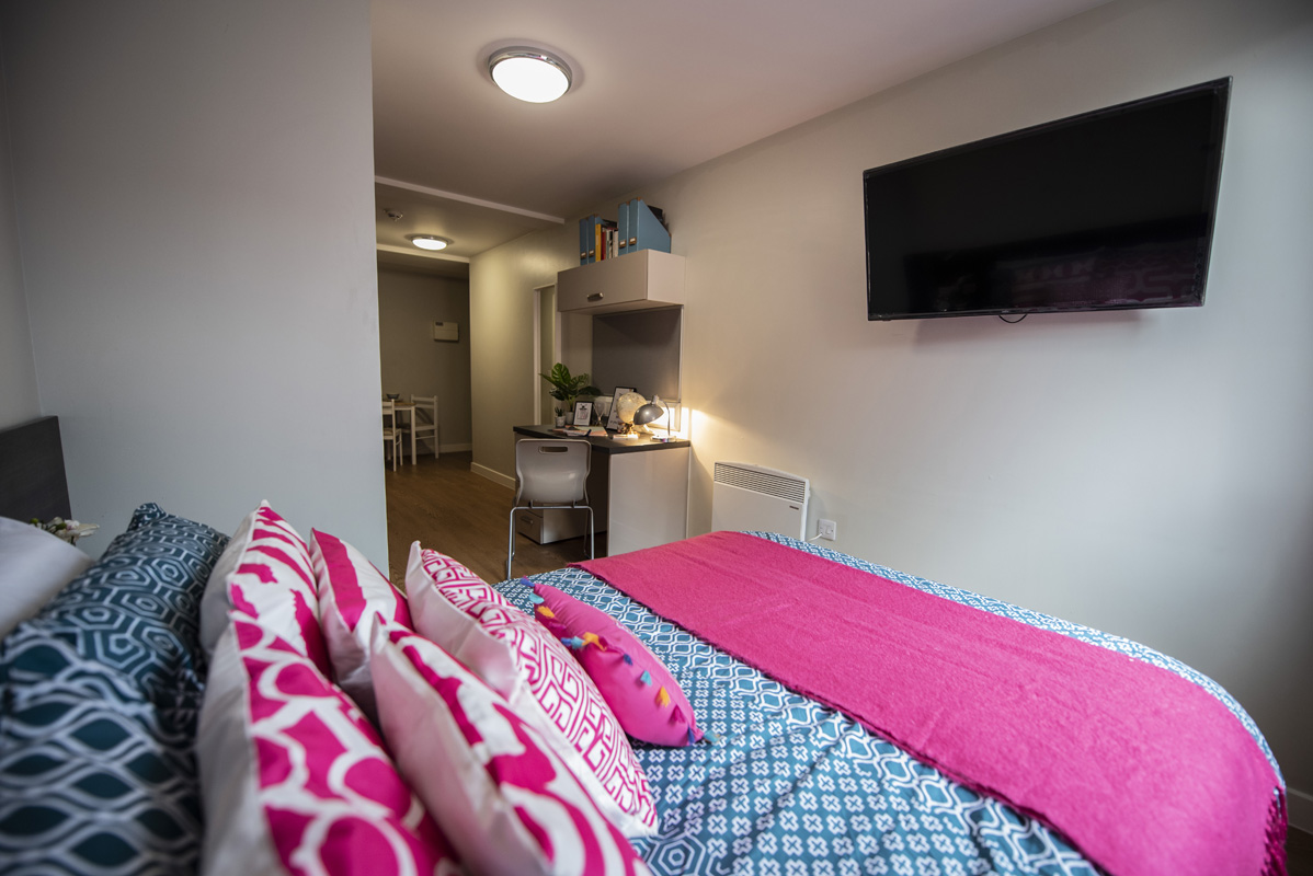 brightly coloured student bed in Chronicle House